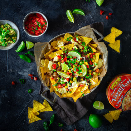 Nachos with melted Tomme de Franche Comté cheese